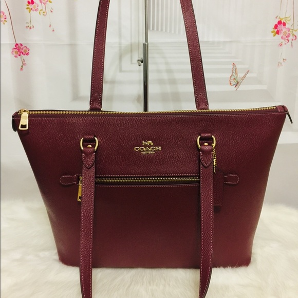 coach wine colored bag